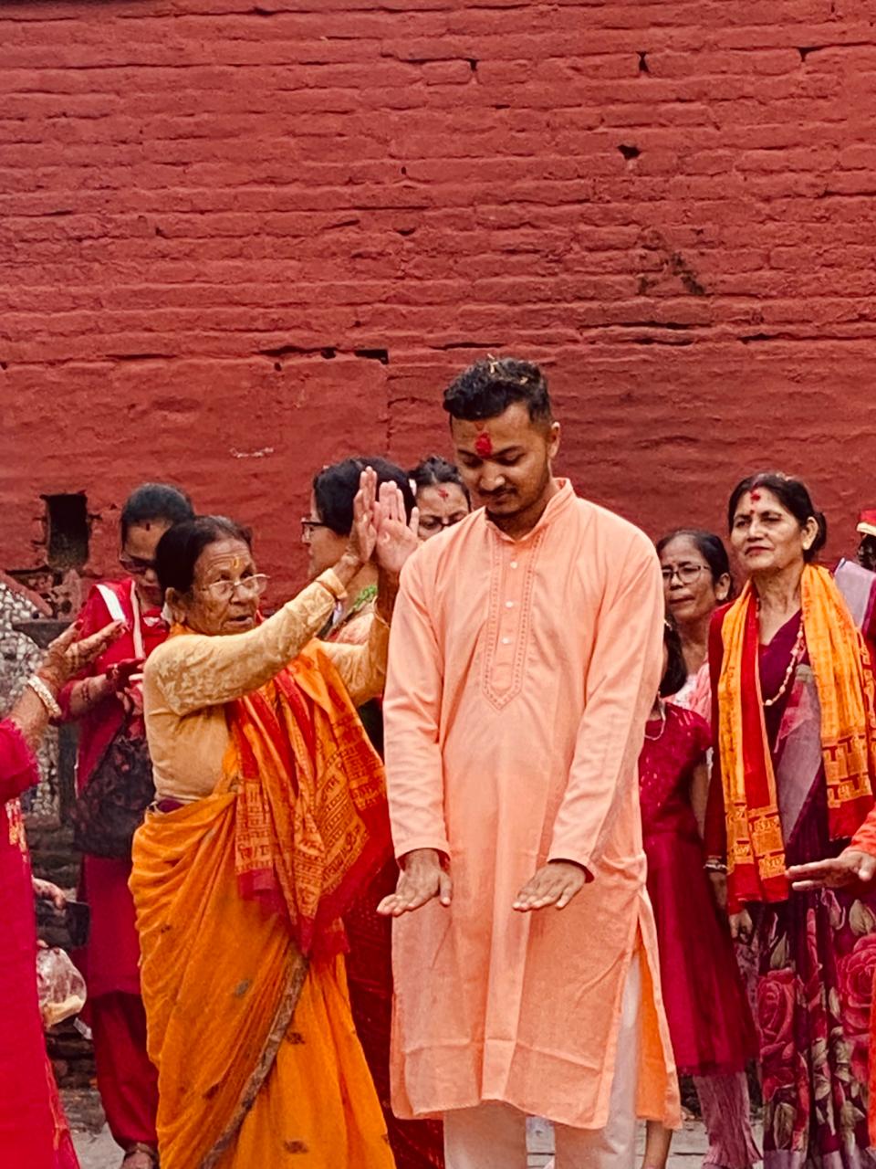 Sudip sitting by the water